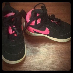Toddler size 5 pink and black nike high tops